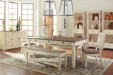 Side view of Bolanburg Two-tone Dining Table showing seating capacity
