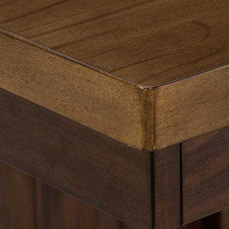 Rylandeen table leg and base detail in two-tone finish