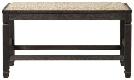Bench placed in dining setting with wood floor