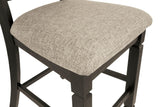 Tyler Creek bar stool with textured black wood legs