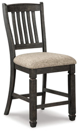 Side view of Tyler Creek black and grayish brown counter height bar stool