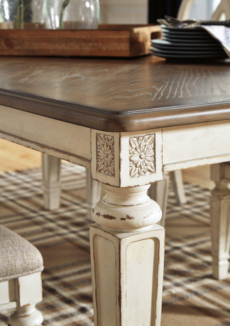 Atmospheric room setting with Realyn dining table