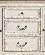 Closeup of dark bronze bail pulls and knobs on Realyn Dining Server