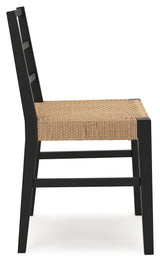 Isanti dining chair with black wood frame and rattan seat detail