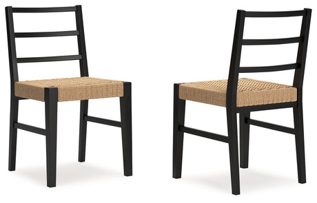 Isanti dining chair side view with woven rattan seat