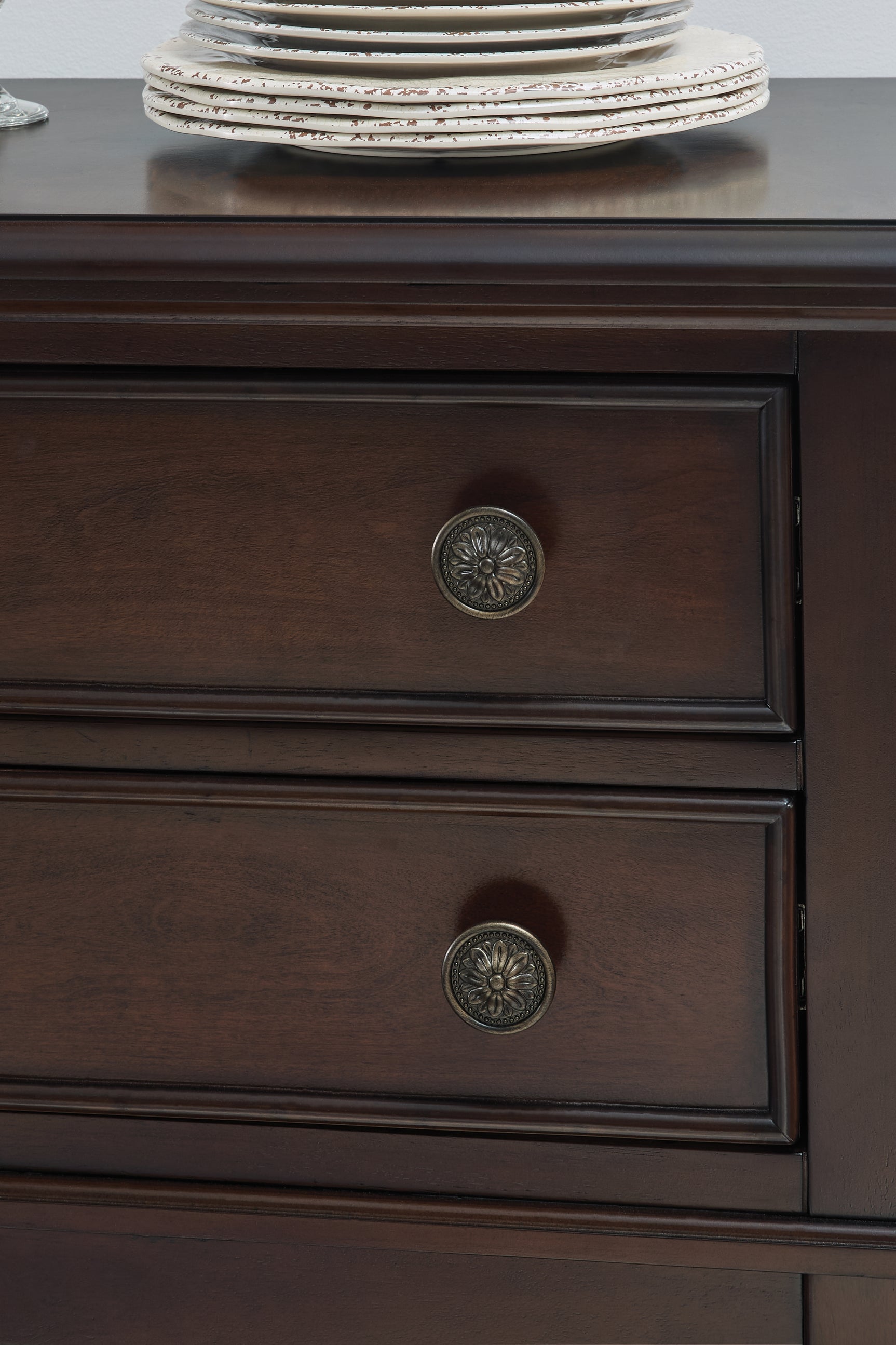 Close-up of dark bronze-tone round knob