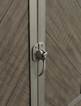Close-up of metal window latch hardware on Krystanza Server