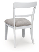 Back view of Greddinton dining chair showing solid wood frame