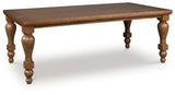 Greddinton Brown Dining Table angled side view