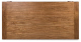 Top view of Greddinton Brown Dining Table showing wood grain