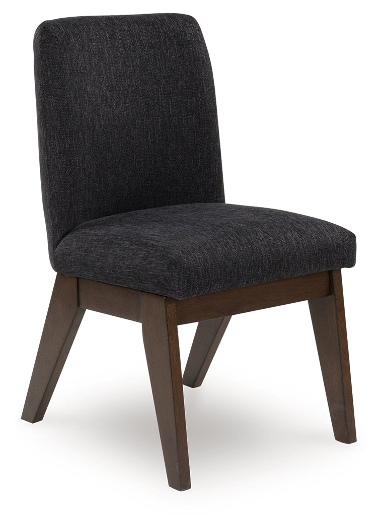 Dilenno dining chair angled view highlighting mid-century style wooden legs