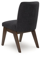 Rear view of Dilenno dining chair showing dark brown wood frame