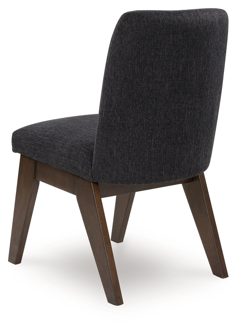 Rear view of Dilenno dining chair showing dark brown wood frame