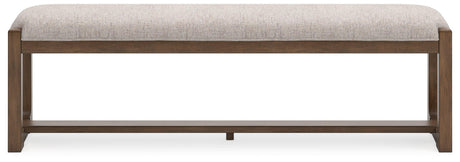 Top view of Cabalynn 63" dining bench showcasing cushioned seat and wood frame