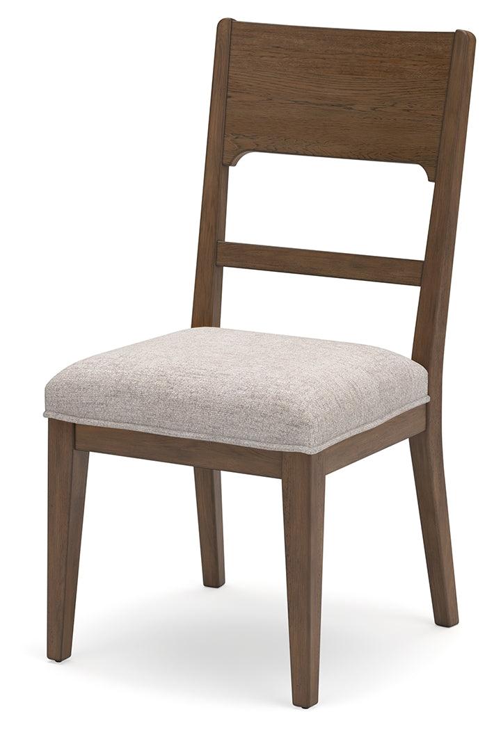 Cabalynn dining chair angled showing wood finish and upholstery detail