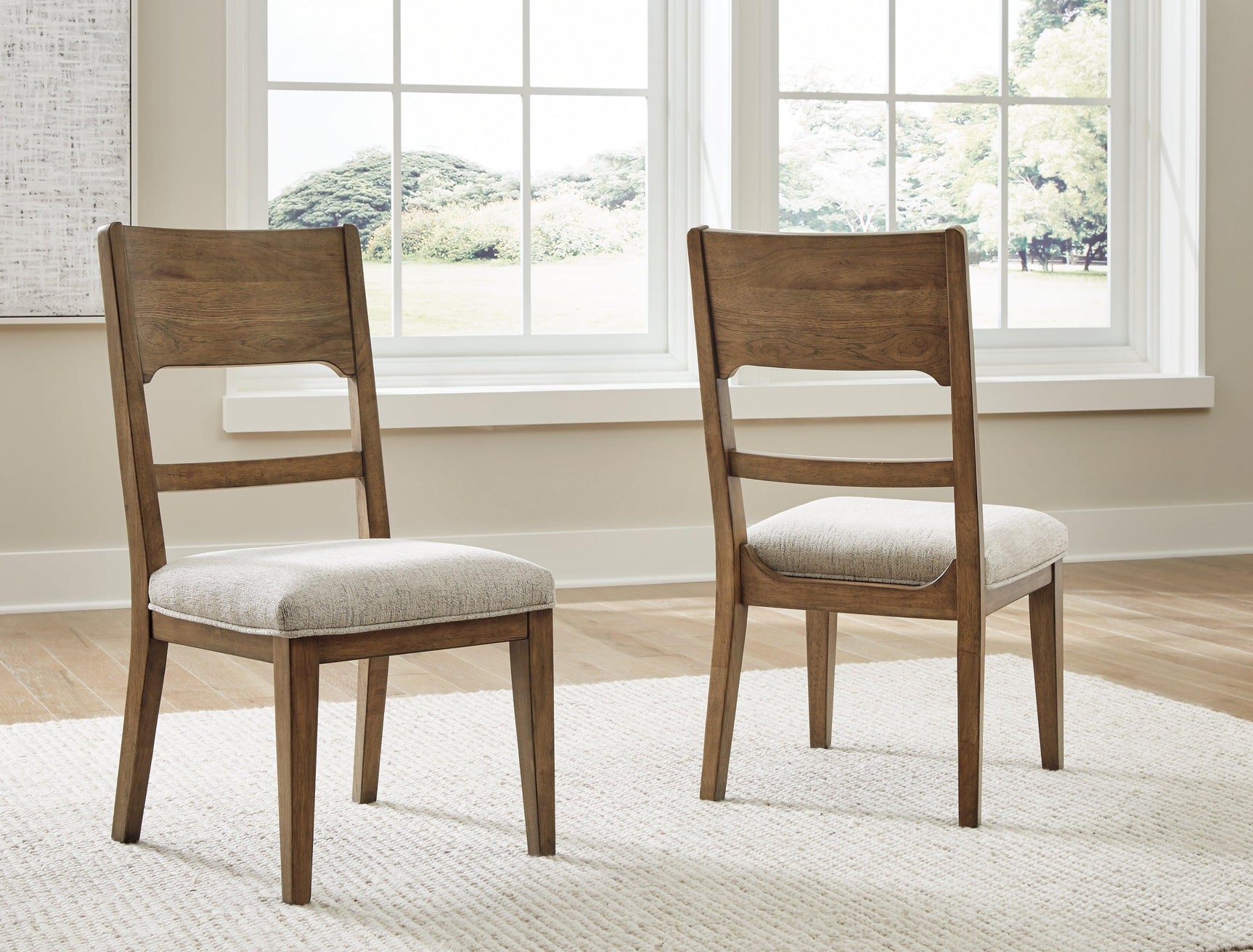 Cabalynn dining chair front face with neutral tones upholstery