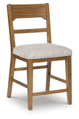 Close-up of oatmeal polyester fabric upholstery on Cabalynn barstool
