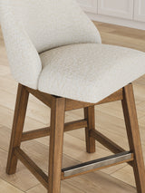 Cabalynn counter height barstool in oatmeal fabric and light brown wood finish