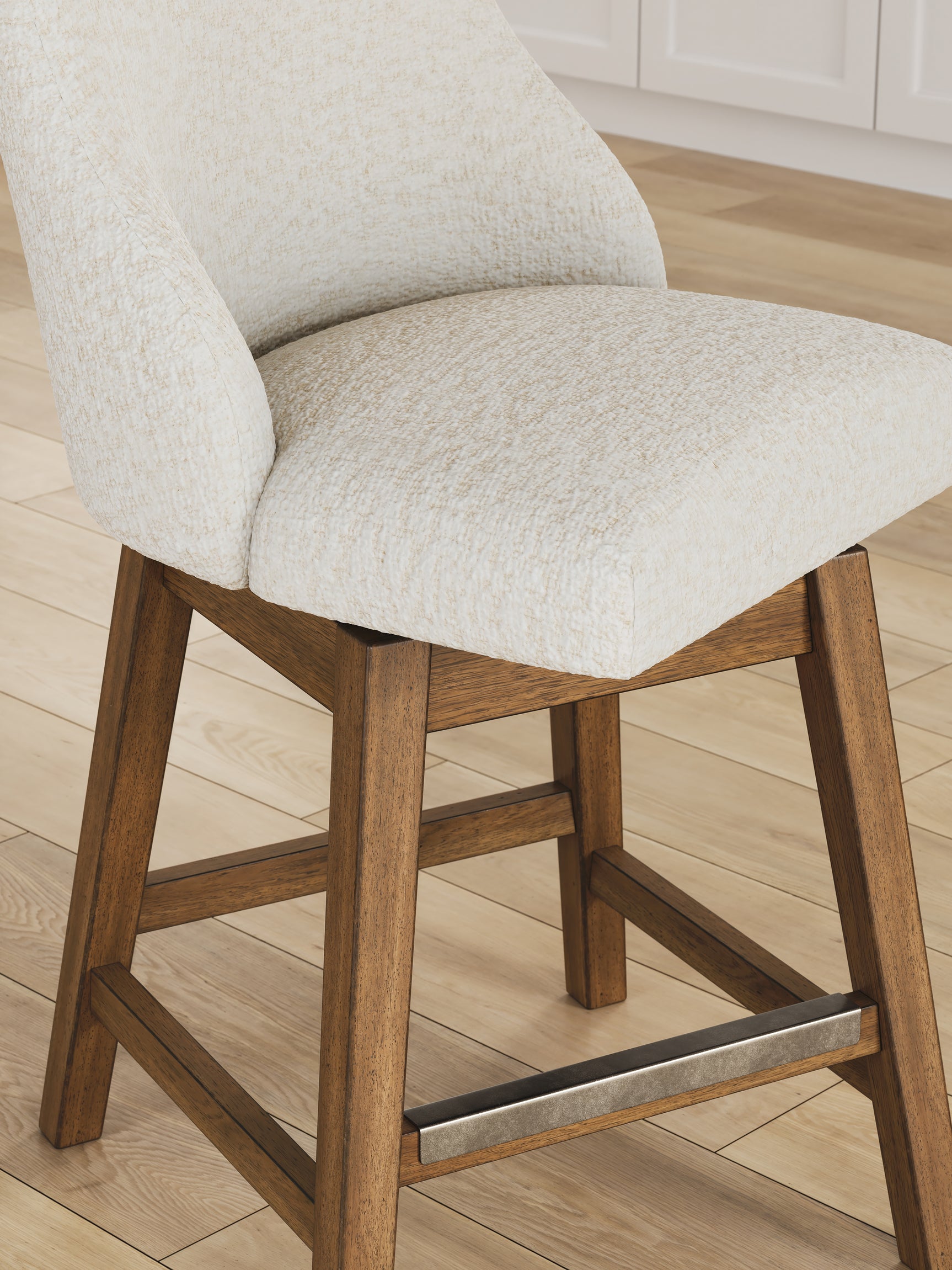 Cabalynn counter height barstool in oatmeal fabric and light brown wood finish