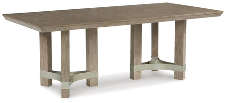 Chrestner Gray Dining Table angled side view showing double pedestal base