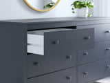 Close-up of drawer hardware and finish on Simmenfort Navy Blue Dresser