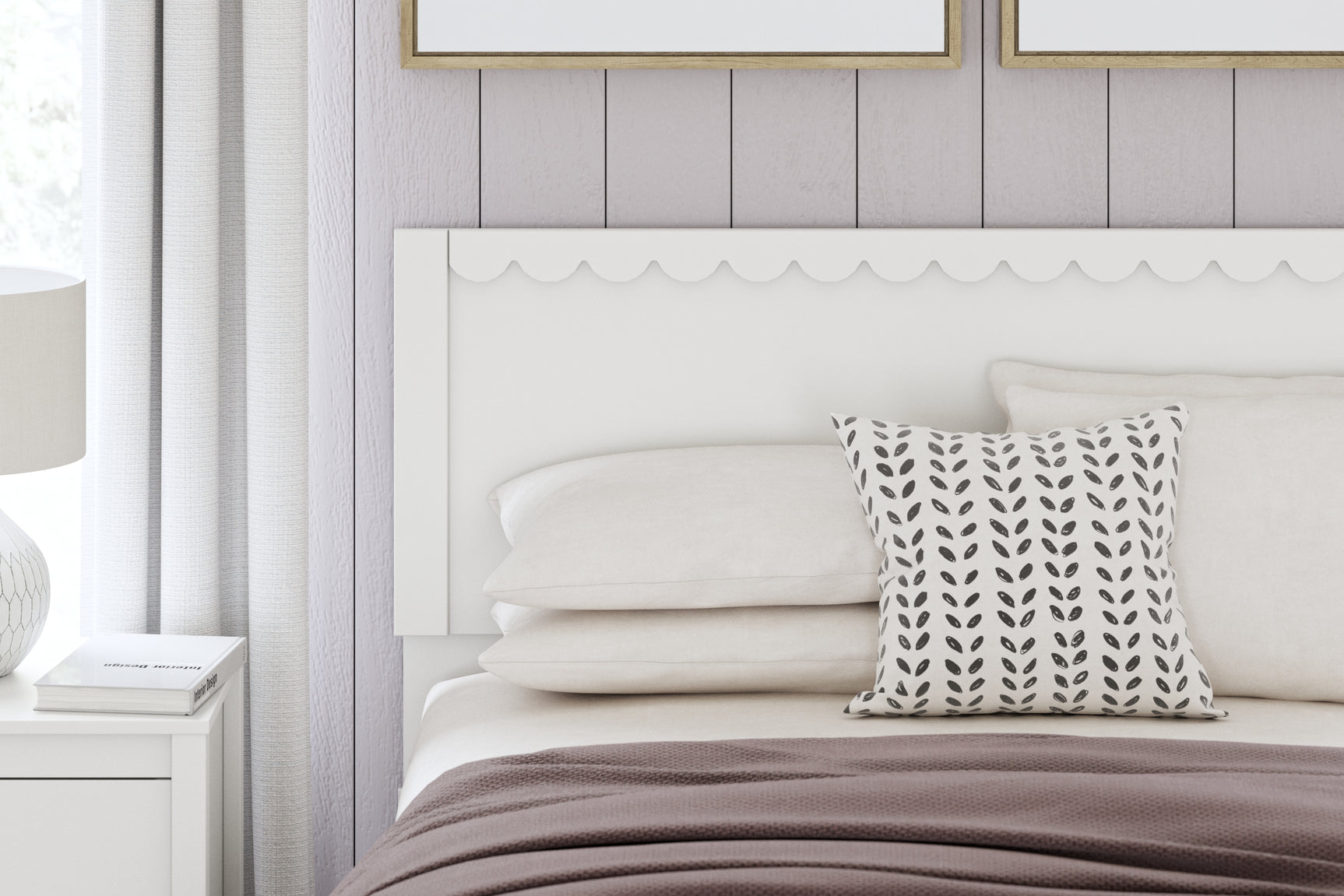 Detail of bed frame headboard scalloped design