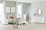 Hallityn Collection bedroom furniture with white twin platform bed