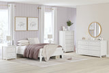 Hallityn Full White Platform Bed - styled in bedroom setting