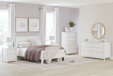 Hallityn Nightstand styled with bedroom furniture in white finish