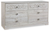 Paxberry whitewash dresser staged in bedroom