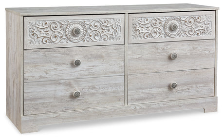 Paxberry whitewash dresser staged in bedroom