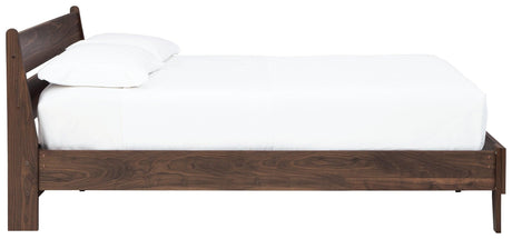 Calverson Mocha Queen Panel Platform Bed - mood setting with bedroom decor