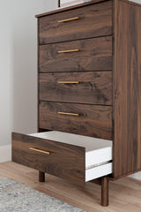 Close-up of drawer handle and wood grain finish