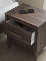 Calverson Mocha Nightstand with open drawer and goldtone handle