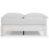 Shawburn Whitewash Queen Platform Bed in bedroom setting