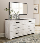 Completed dresser in a bedroom setting