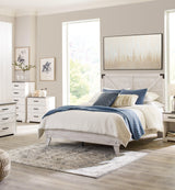 Detail of distressed whitewash finish and pewter hardware on Shawburn bed
