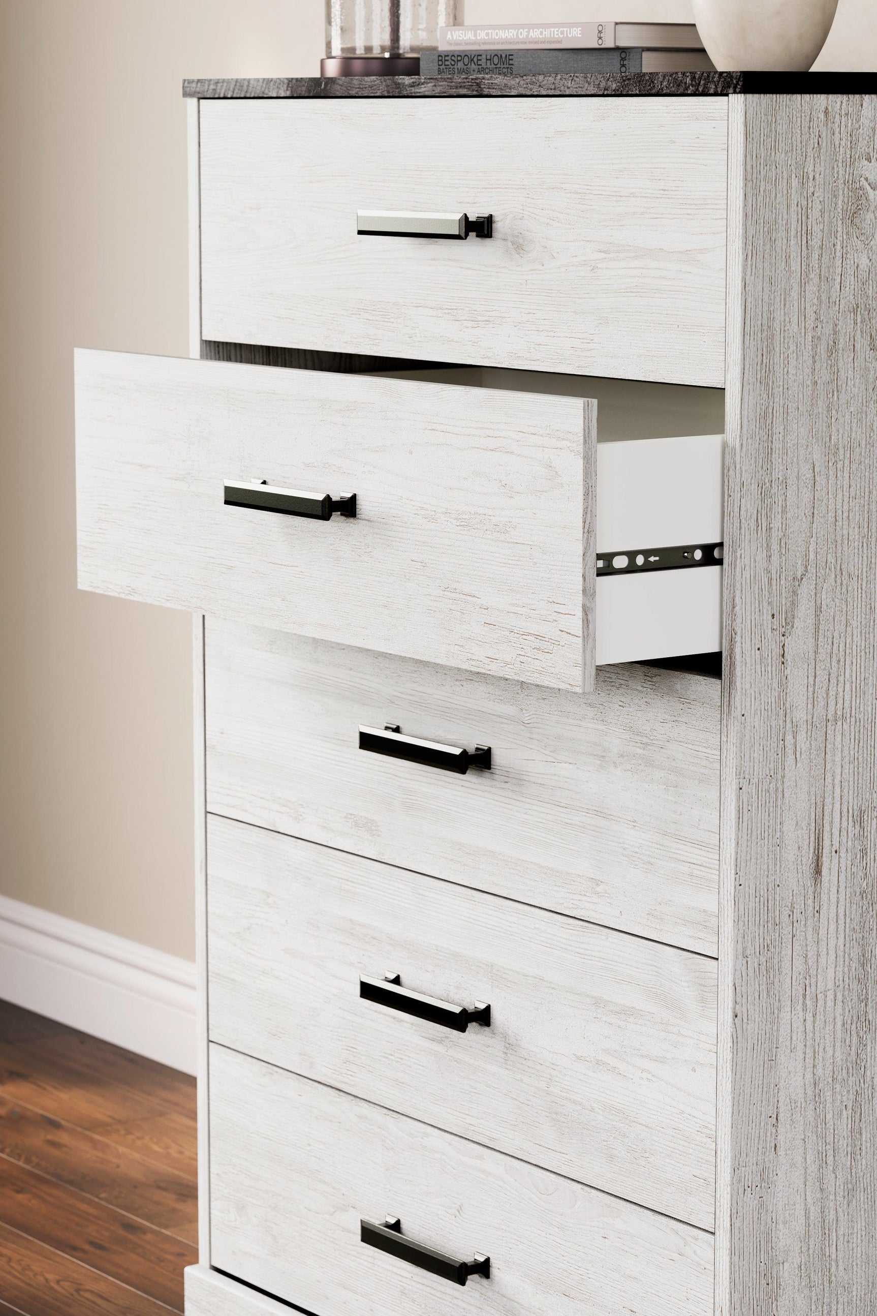 Close-up detail of Shawburn chest of drawers pewter-tone pulls and finish