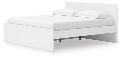 Onita King bed side angle with drawers closed