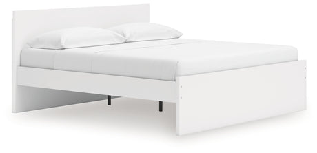 Onita King Bed side view showing panel headboard
