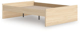 Close-up of bed headboard with natural finish