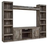 Side angle of Wynnlow TV stand with adjustable shelves and wire cutouts