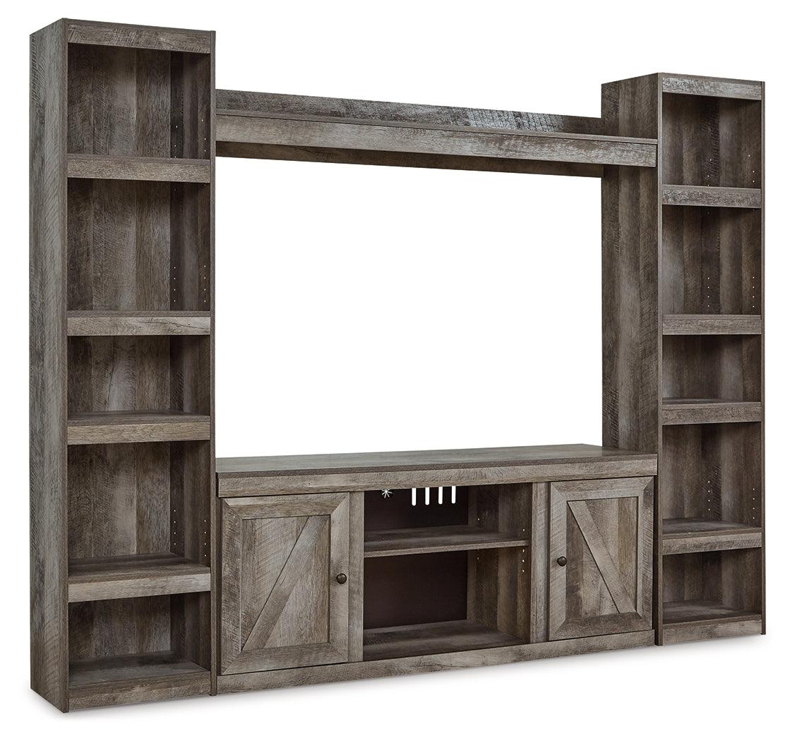 Side angle of Wynnlow TV stand with adjustable shelves and wire cutouts