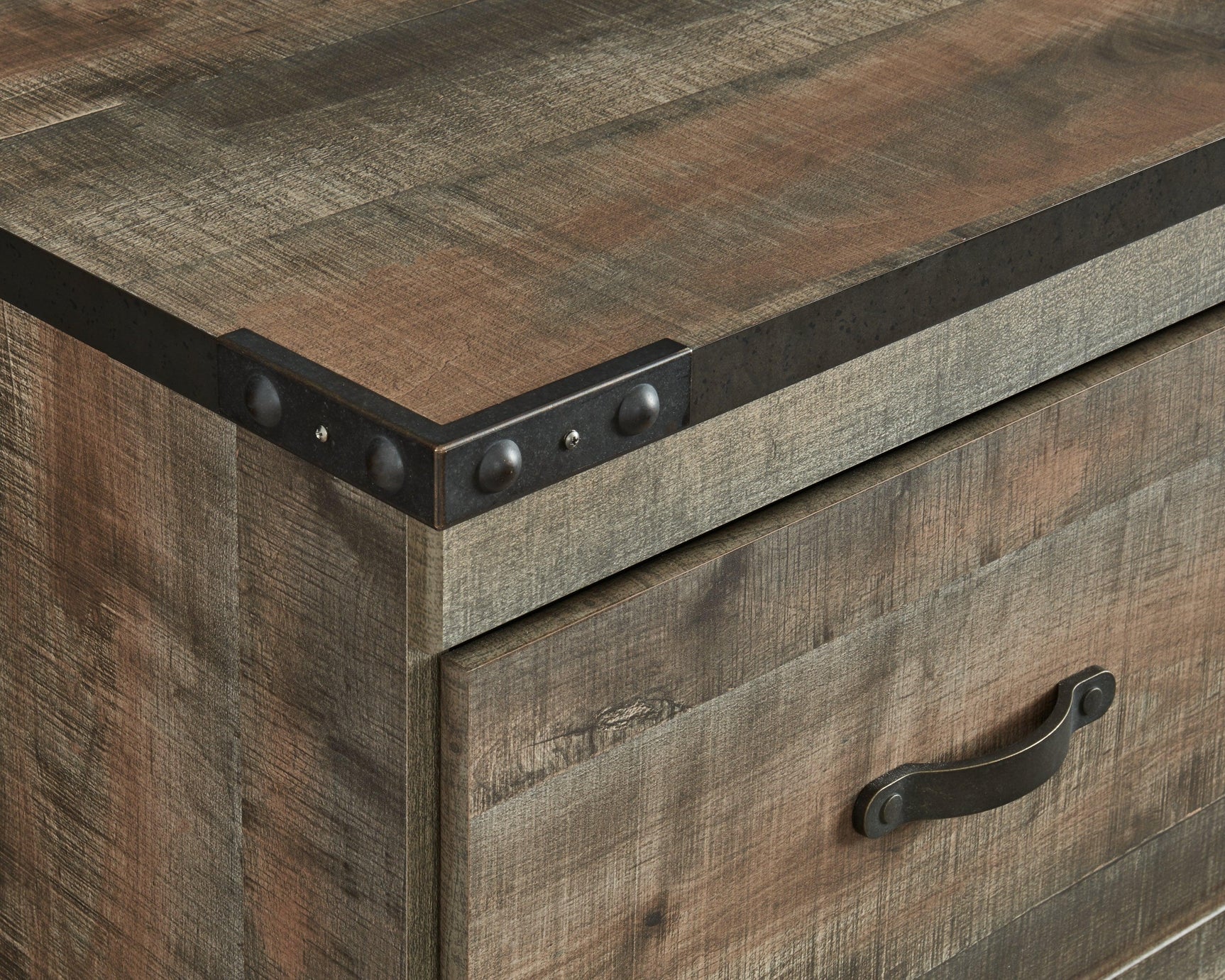 Close-up of dark bronze hardware and plank finish