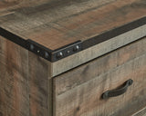 Close-up of rustic plank-style finish and dark bronze hardware on Trinell entertainment center