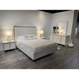 Fiocco beige upholstered bed headboard close up
