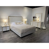 Fiocco beige upholstered bed headboard close up