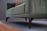 Side angle of Dorian Green 3-Seater Sofa showcasing arm design
