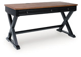 Side view of Wildenauer desk with closed drawers and drop-down keyboard tray