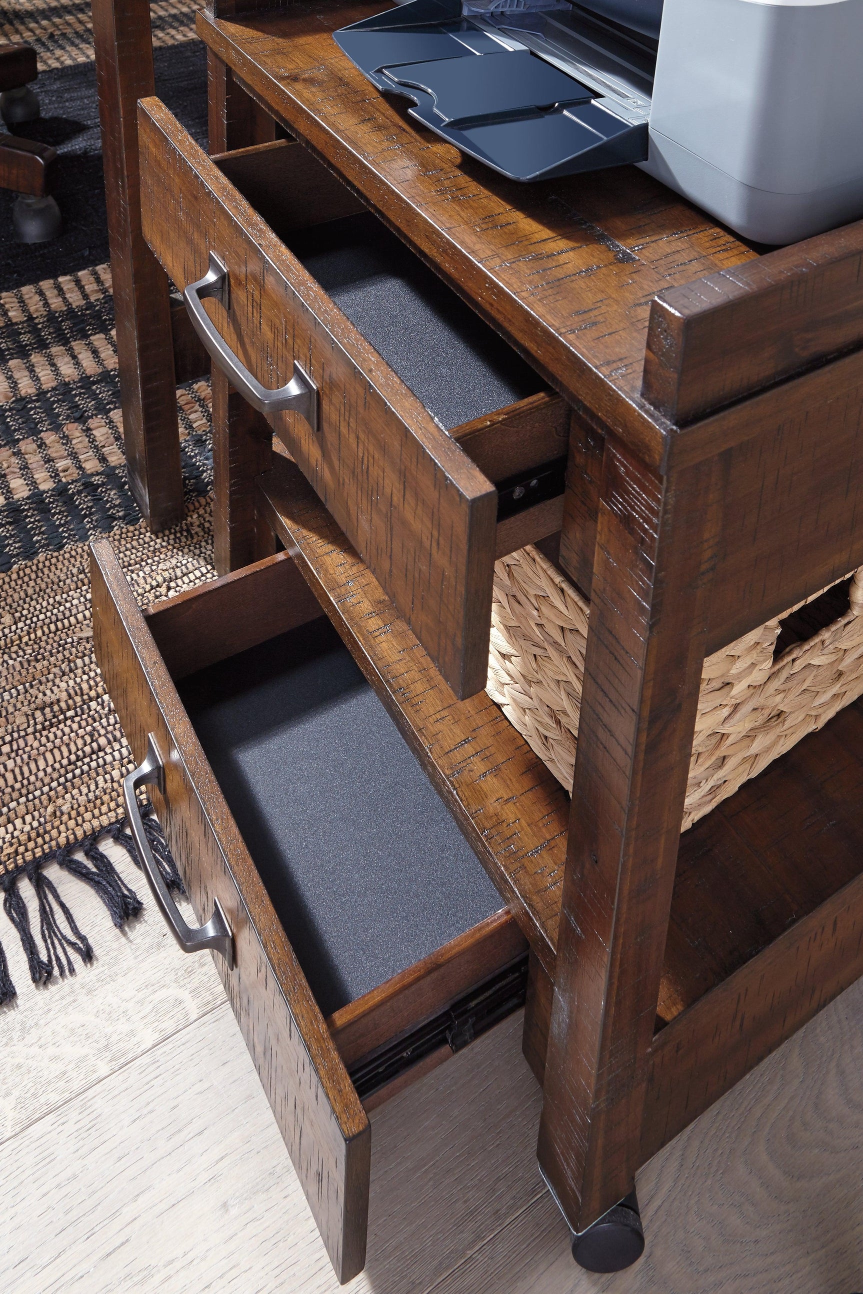 Close-up on rustic brown finish and zinc-color hardware of Baldridge Printer Stand